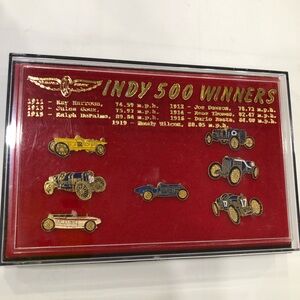 Vintage lapel pins commemorating early Indianapolis 500 race winners 1911 -1916